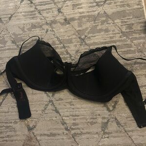 Beautiful, elegant, black bra with Lacey top. 34F